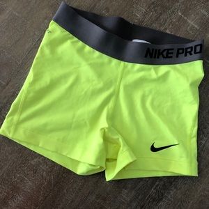 Neon Nike running shorts